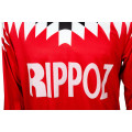 Photo du logo Rippoz du maillot de football rétro Guingamp années 1994/95 - 1995/96. 